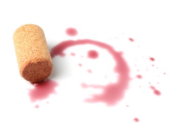 Photo of Bottle cork with wine stains isolated on white