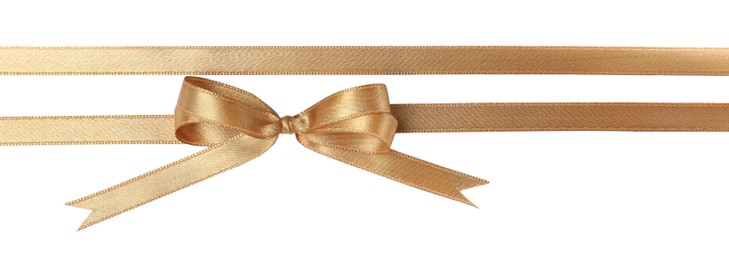 Photo of Beautiful golden ribbons with bow on white background, top view