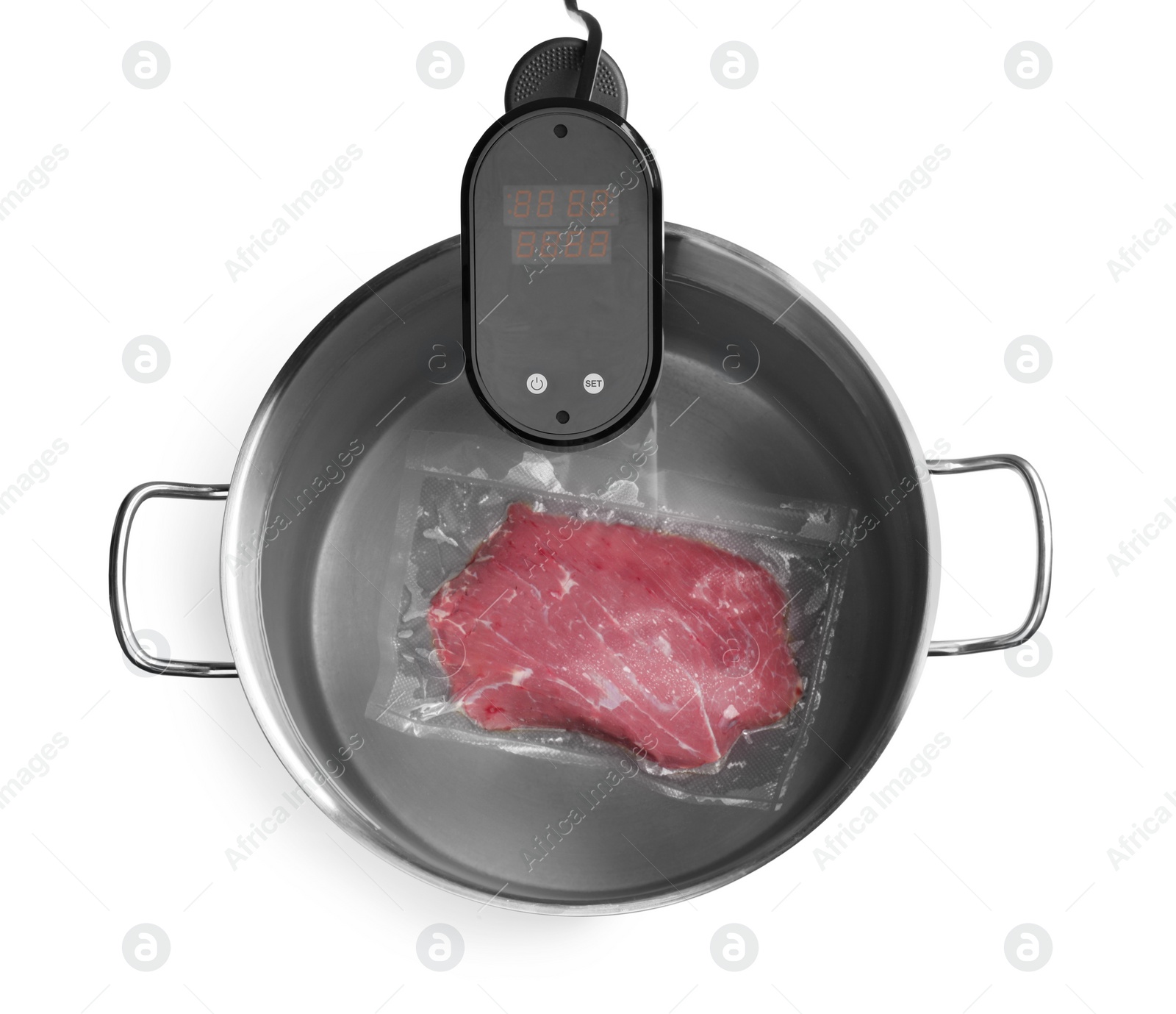 Photo of Thermal immersion circulator and meat in pot on white background, top view. Vacuum packing for sous vide cooking