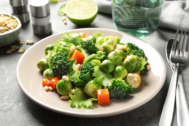 Plate of salad with Brussels sprouts served on table