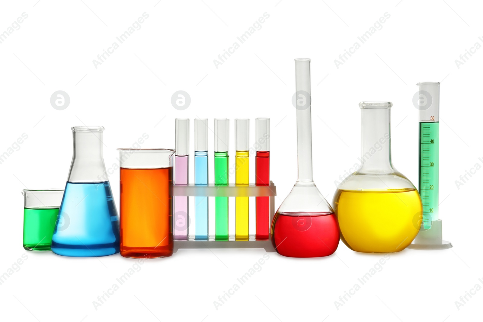 Photo of Laboratory glassware with colorful liquids on white background