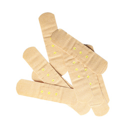 Photo of Medical sticking plasters isolated on white. First aid item