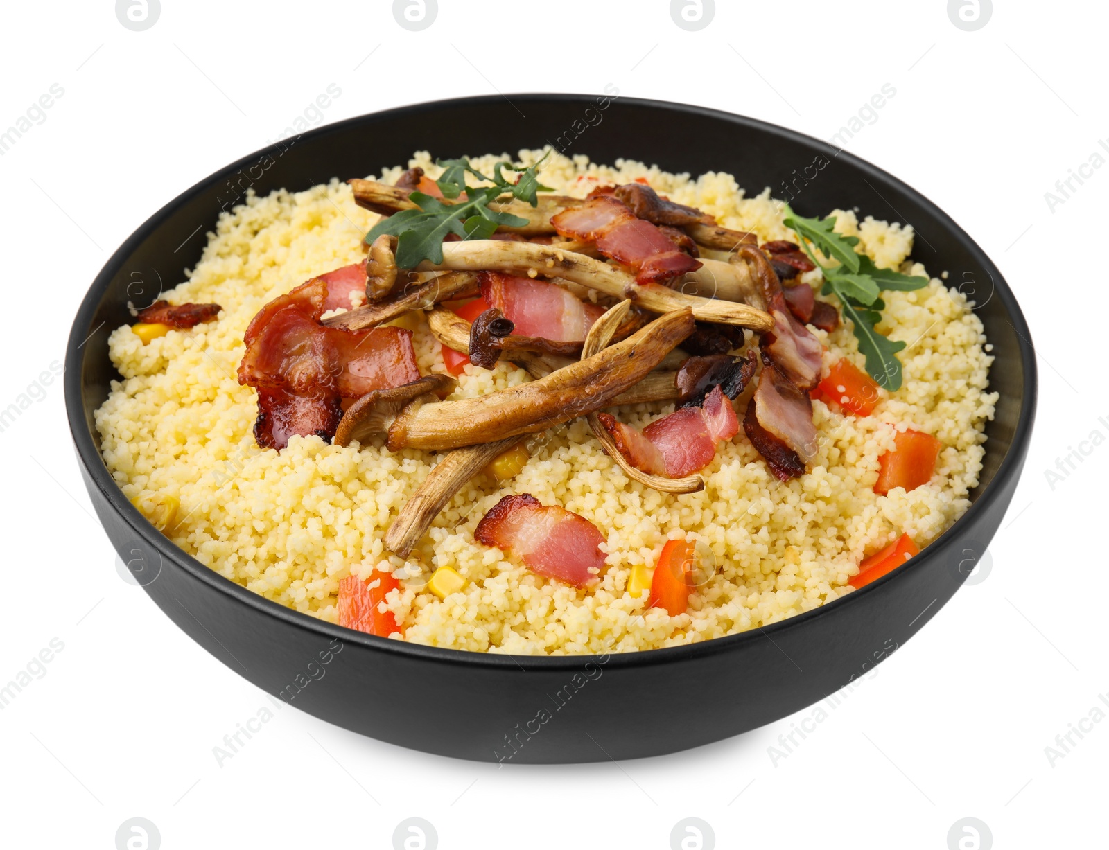 Photo of Tasty couscous with mushrooms and bacon in bowl isolated on white