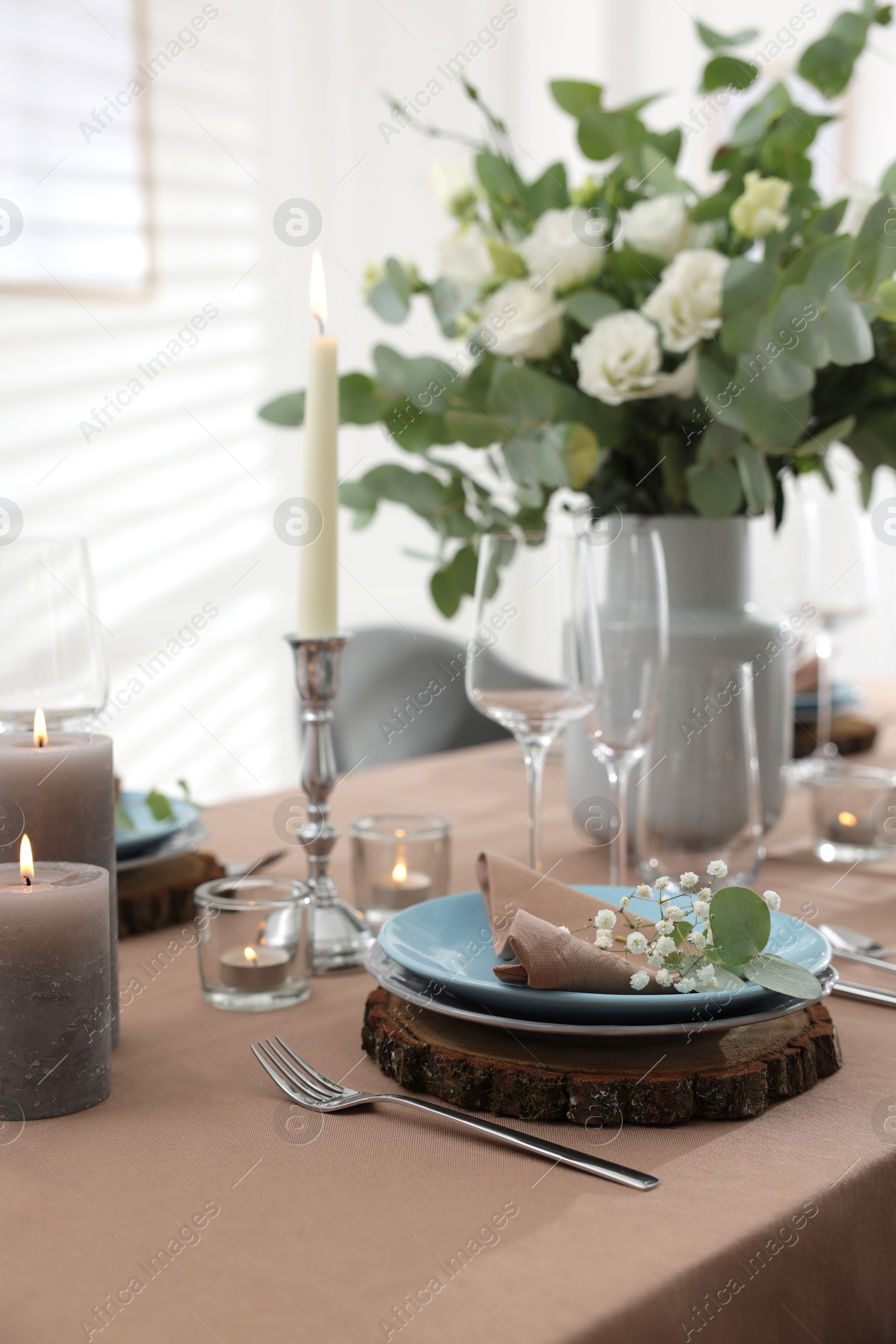 Photo of Festive table setting with beautiful tableware and decor indoors