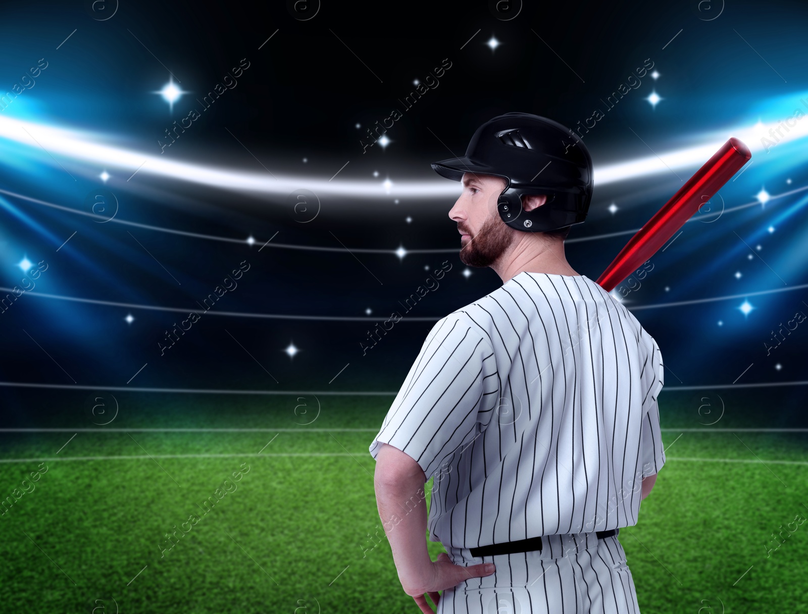 Image of Professional baseball player with bat on stadium