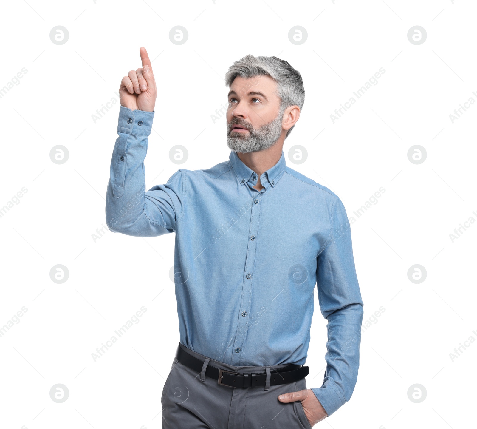 Photo of Mature businessman in stylish clothes posing on white background