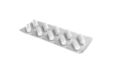 Pills in blister pack on white background