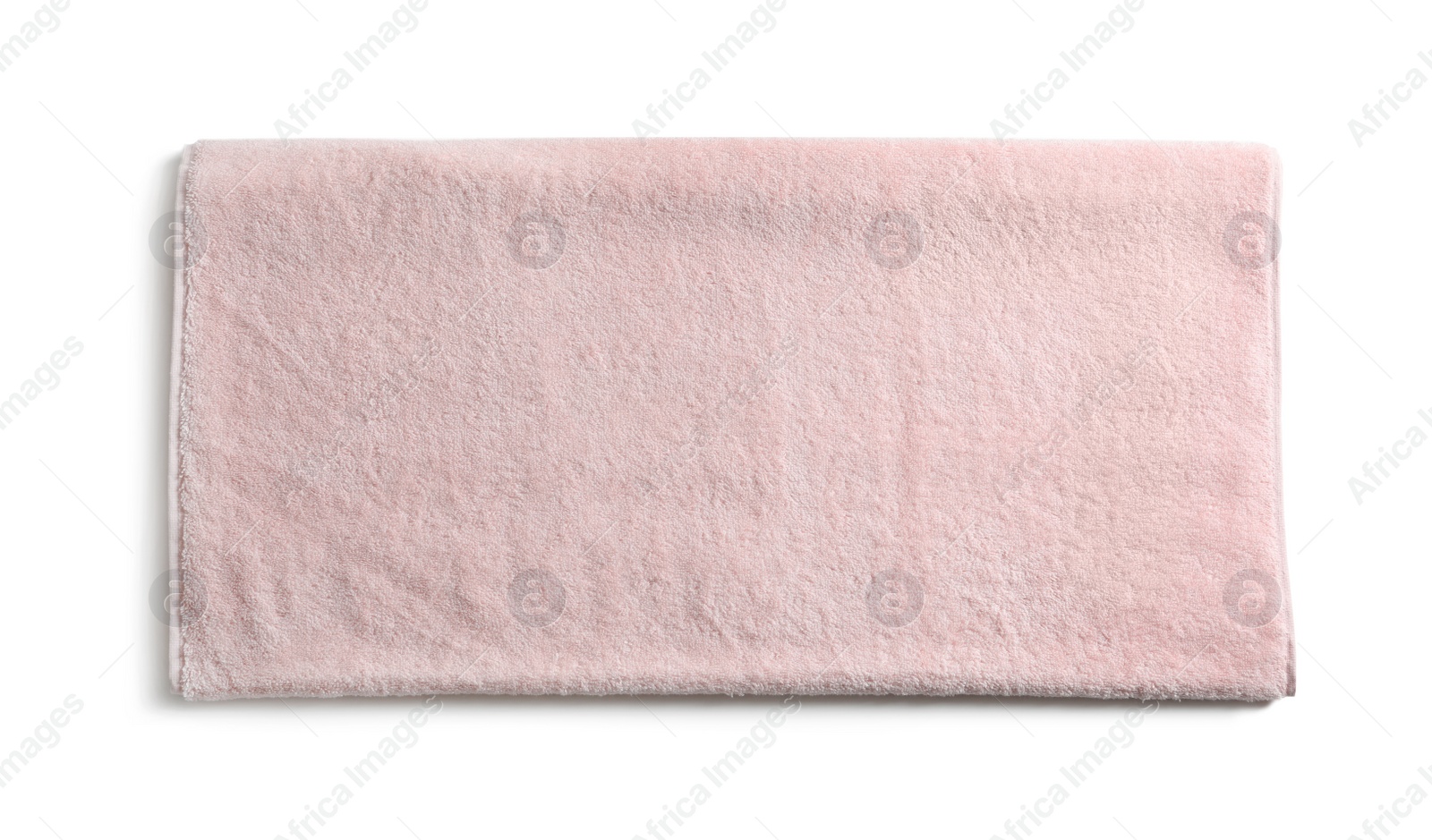 Photo of Folded soft terry towel on white background, top view
