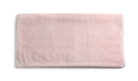 Folded soft terry towel on white background, top view