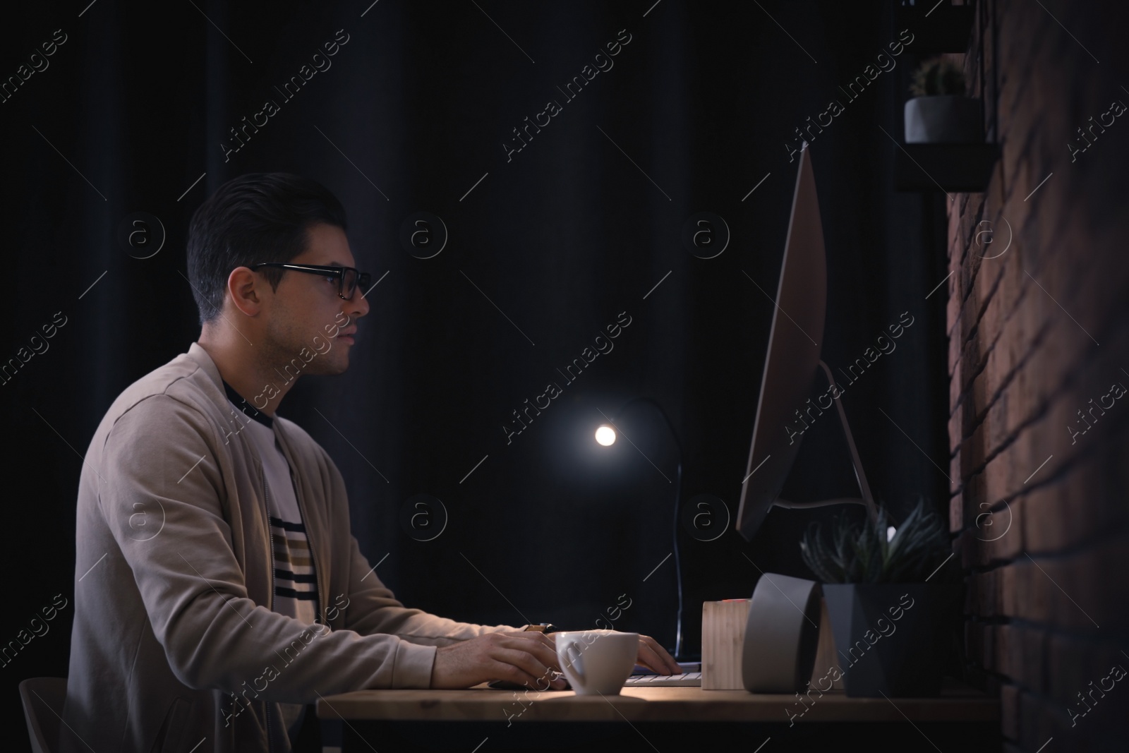 Image of Journalist working with modern computer in office