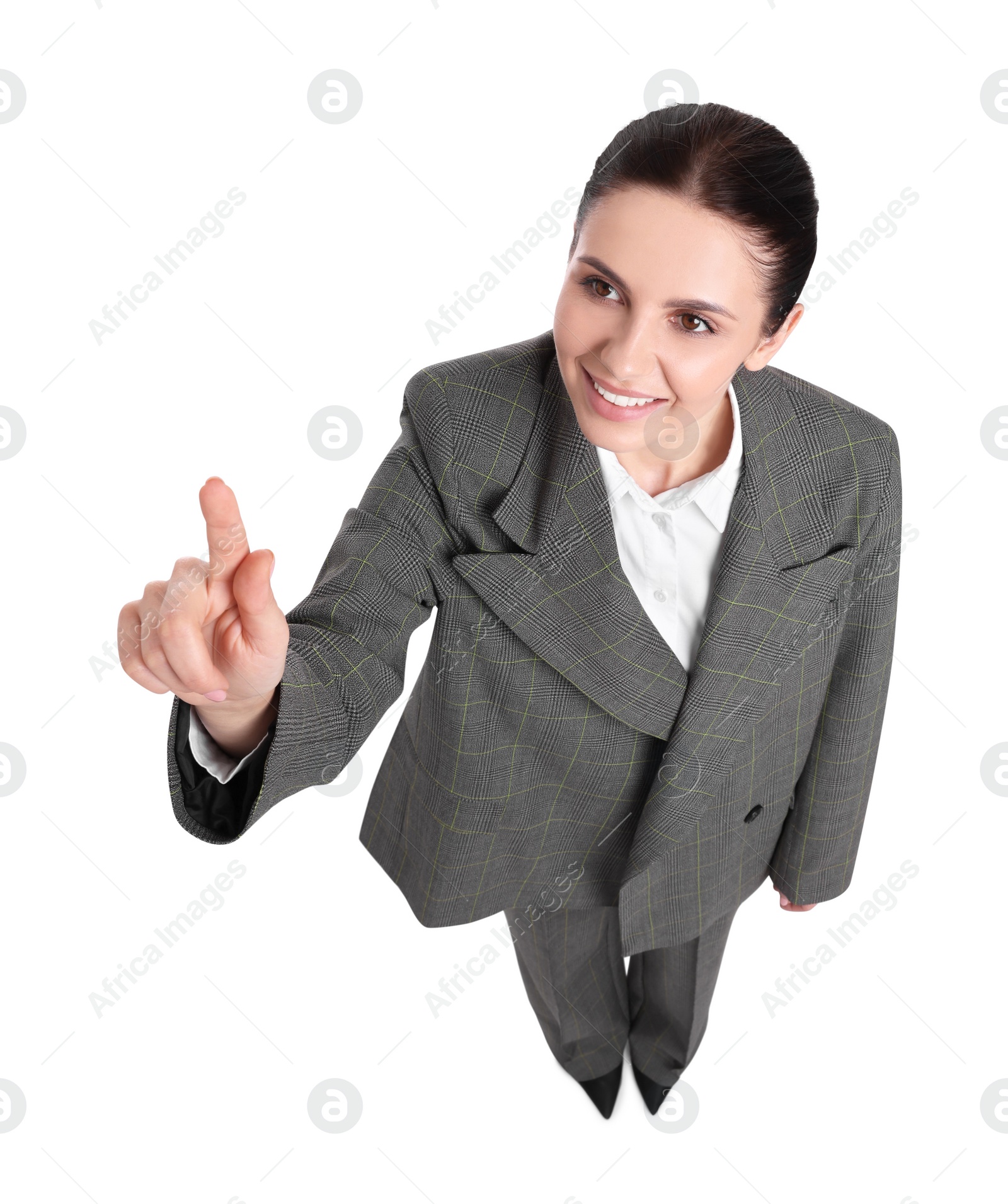 Photo of Beautiful businesswoman in suit pointing at something on white background, above view