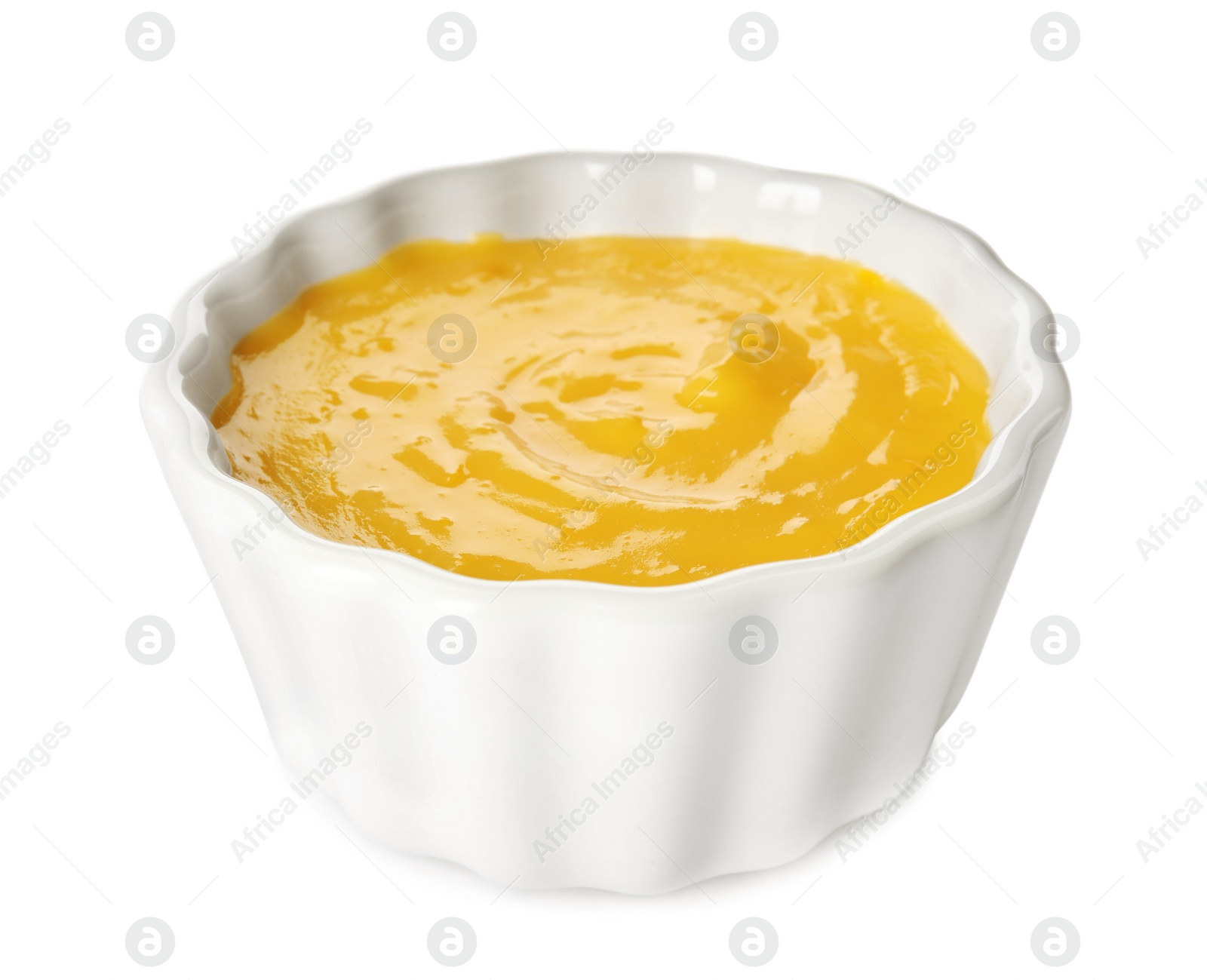 Photo of Bowl with delicious lemon curd isolated on white