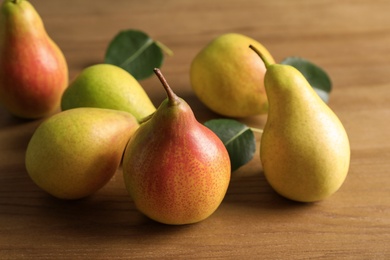 Ripe pears on wooden table. Healthy snack