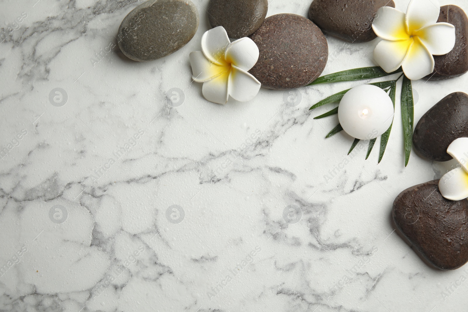 Photo of Flat lay composition with stones on white marble background, space for text. Zen concept