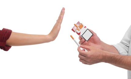 Photo of Stop smoking concept. Woman refusing cigarettes on white background, closeup