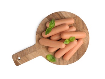 Photo of Delicious boiled sausages and basil isolated on white, top view