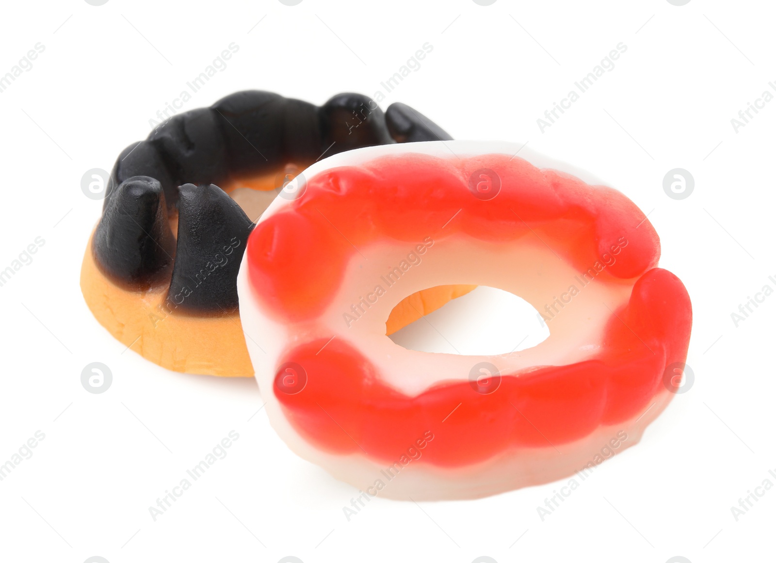 Photo of Delicious colorful candies on white background. Halloween sweets