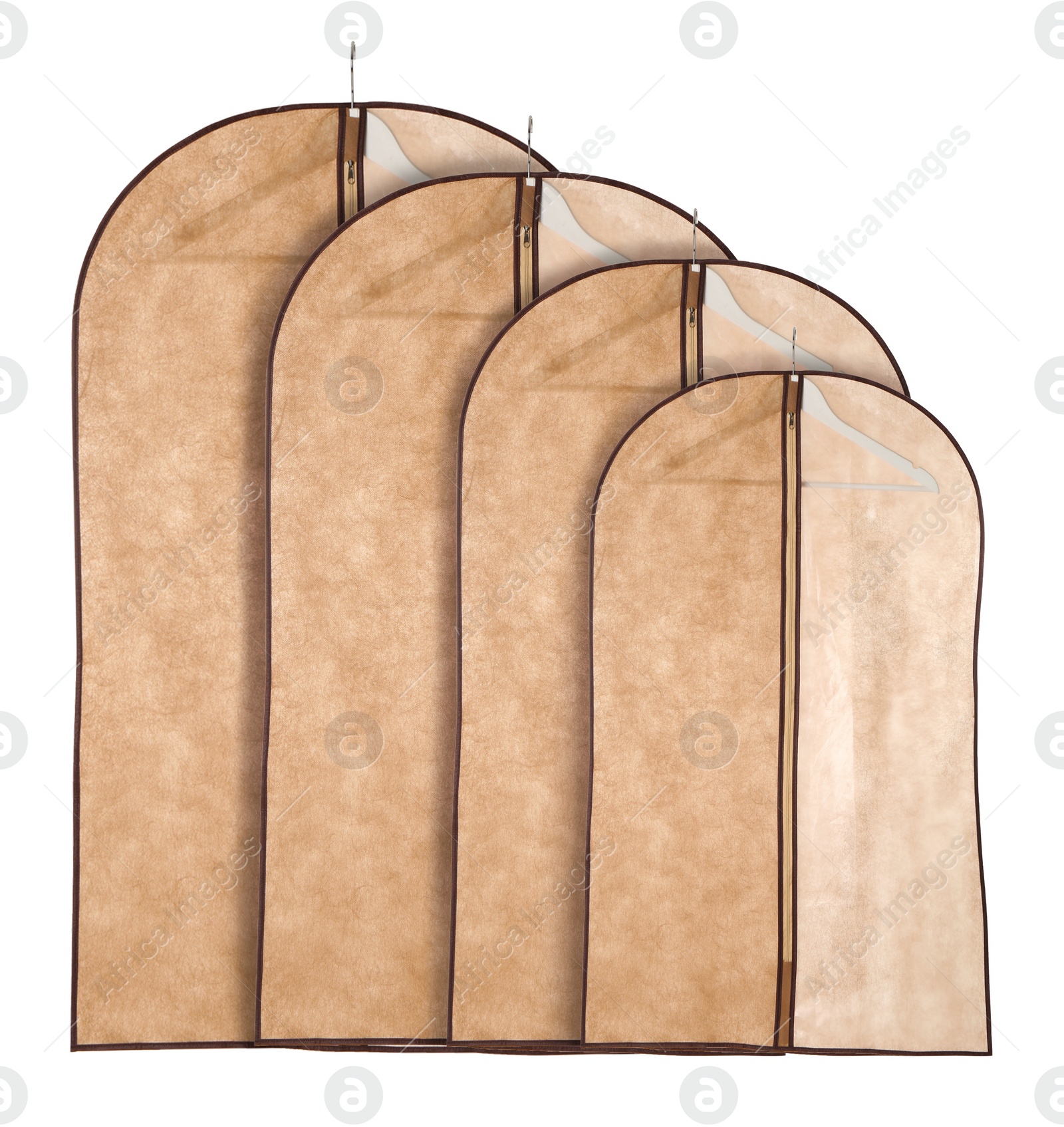 Image of Set with garment bags for clothes on white background 