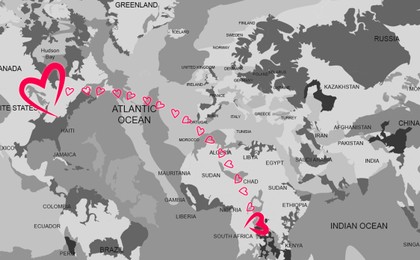 Love in long-distance relationship. Connecting line of pink hearts between countries on world map