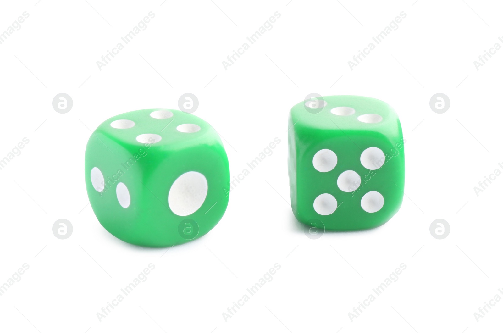 Photo of Two green game dices isolated on white