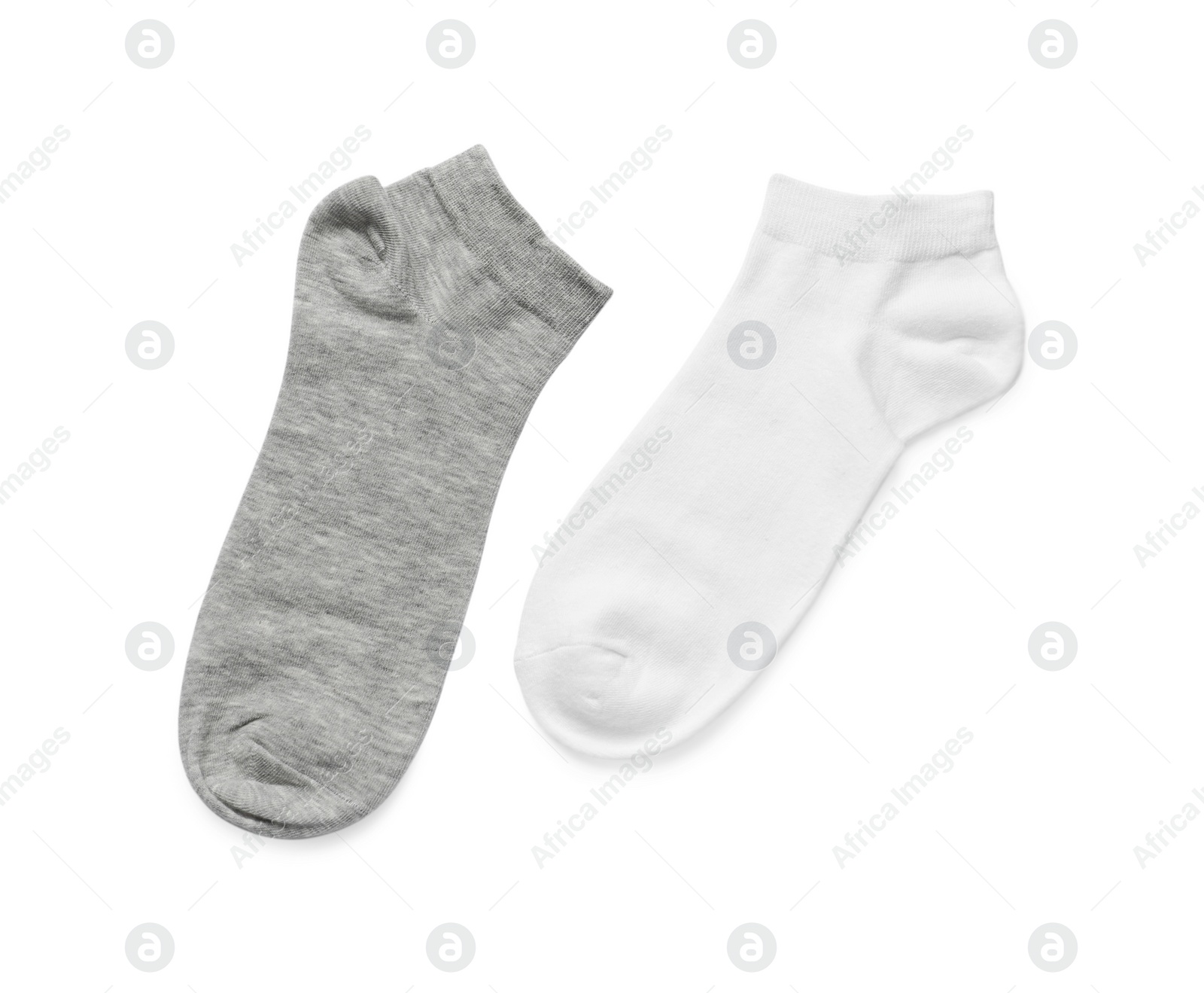 Photo of Different socks isolated on white, top view