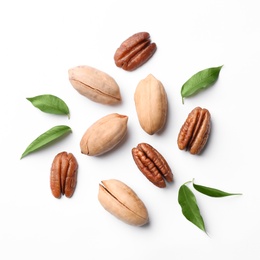 Photo of Composition with pecan nuts and leaves on white background, top view