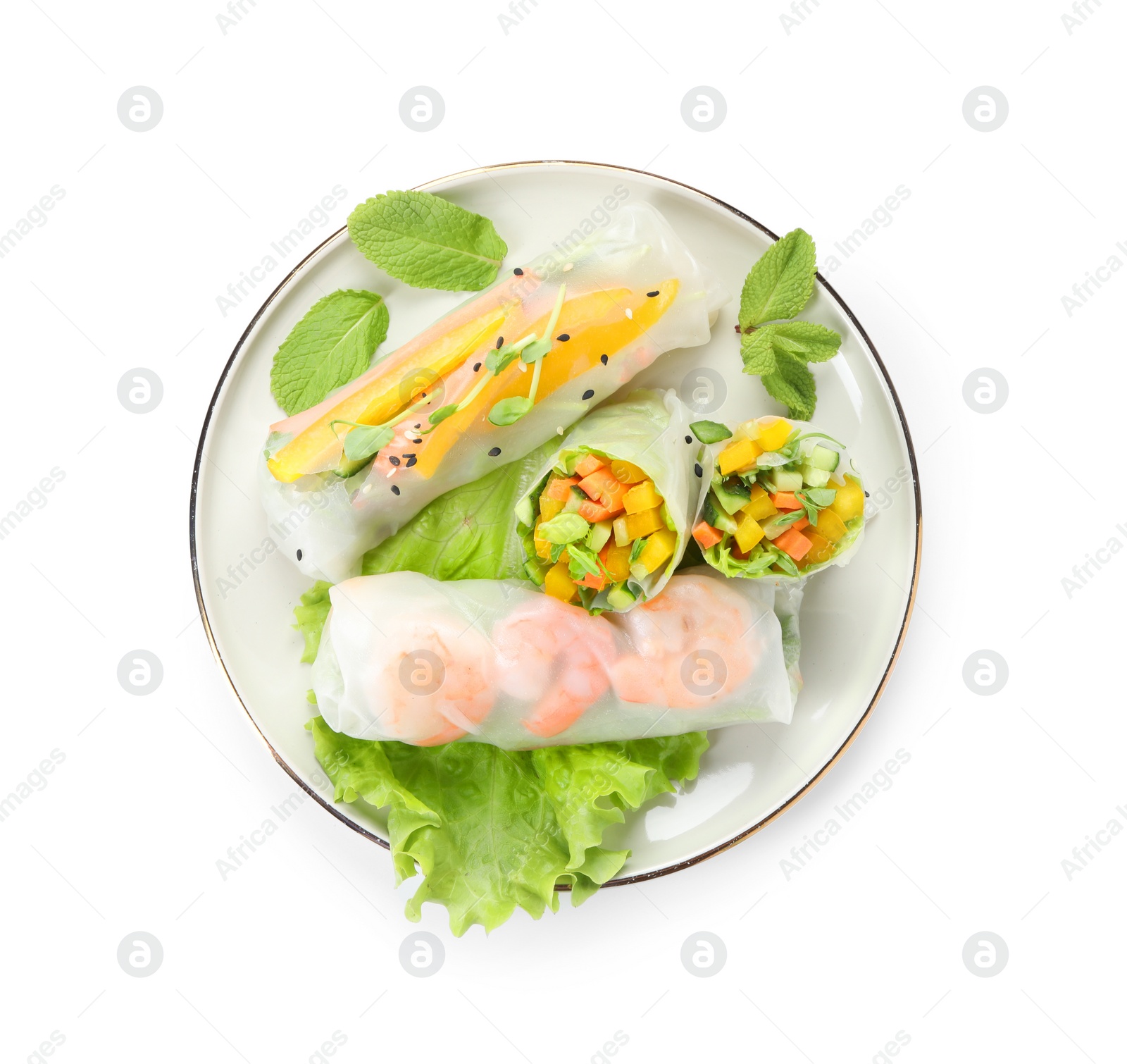 Photo of Plate with tasty spring rolls isolated on white, top view