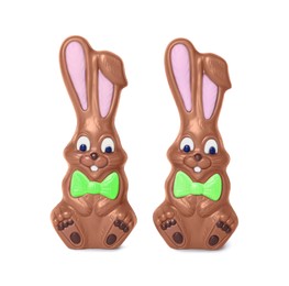 Photo of Two chocolate bunnies isolated on white. Easter celebration