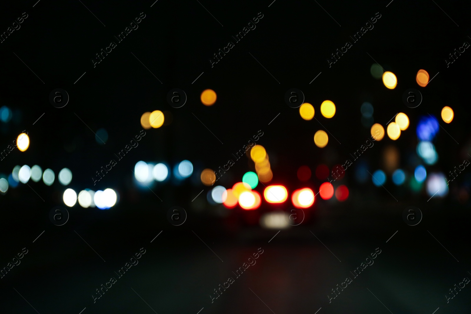 Photo of Blurred view of city at night. Bokeh effect