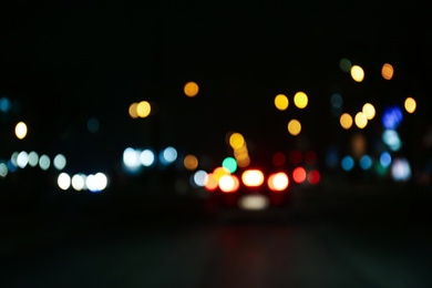 Photo of Blurred view of city at night. Bokeh effect