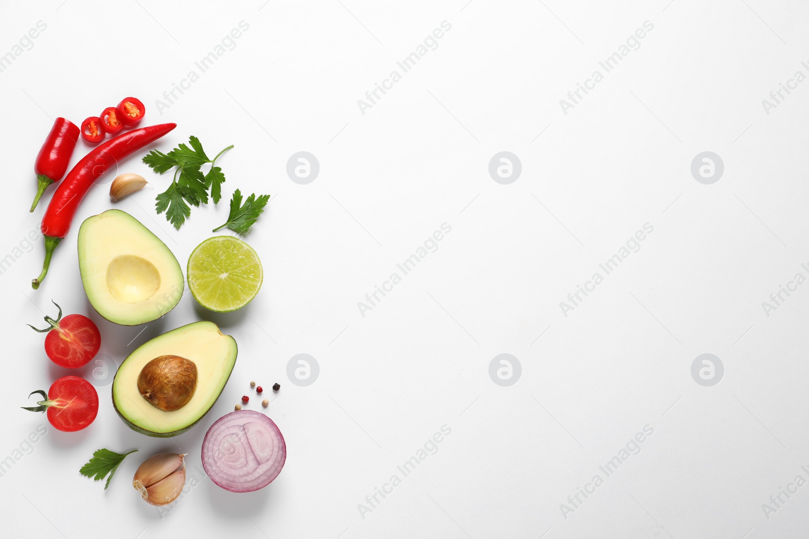 Photo of Fresh ingredients for guacamole on white background, flat lay