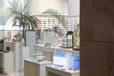 Photo of Showcase with different glasses in optical store