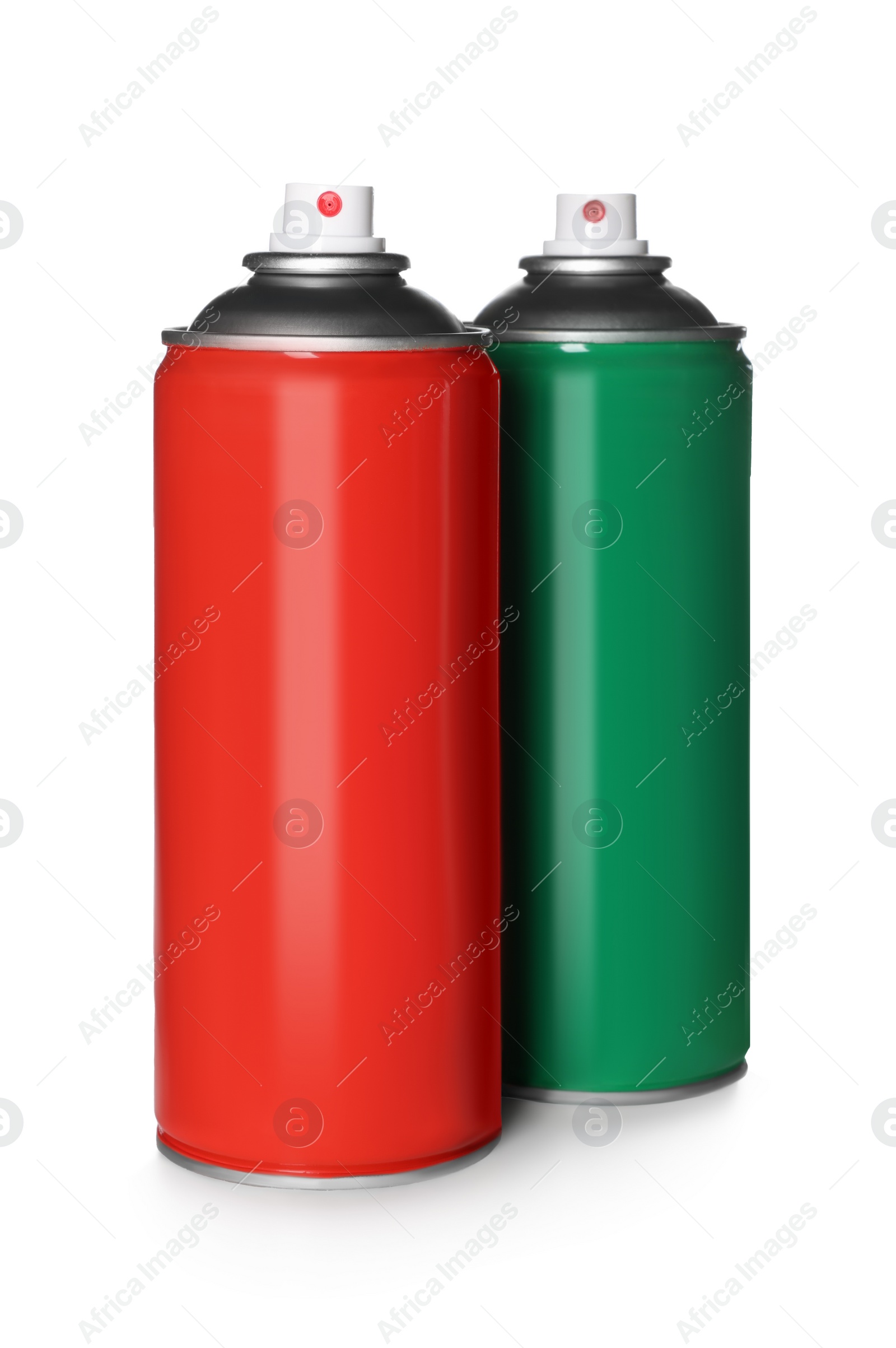 Photo of Colorful cans of spray paints on white background