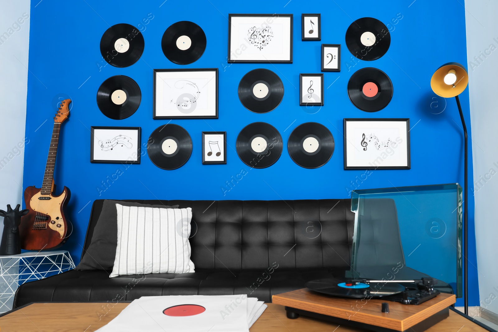 Photo of Living room decorated with vinyl records. Interior design