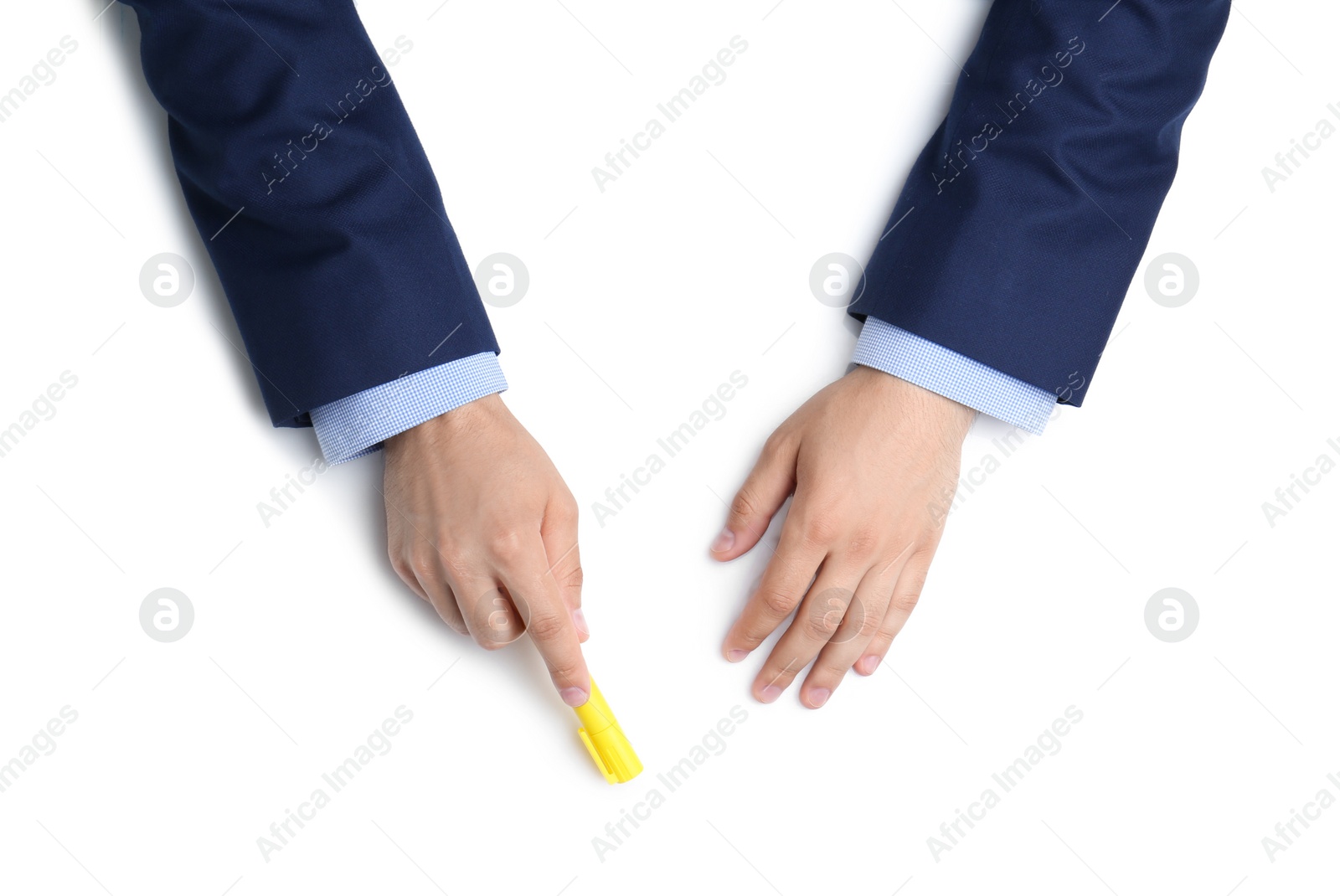 Photo of Man with marker on white background, top view. Closeup of hands