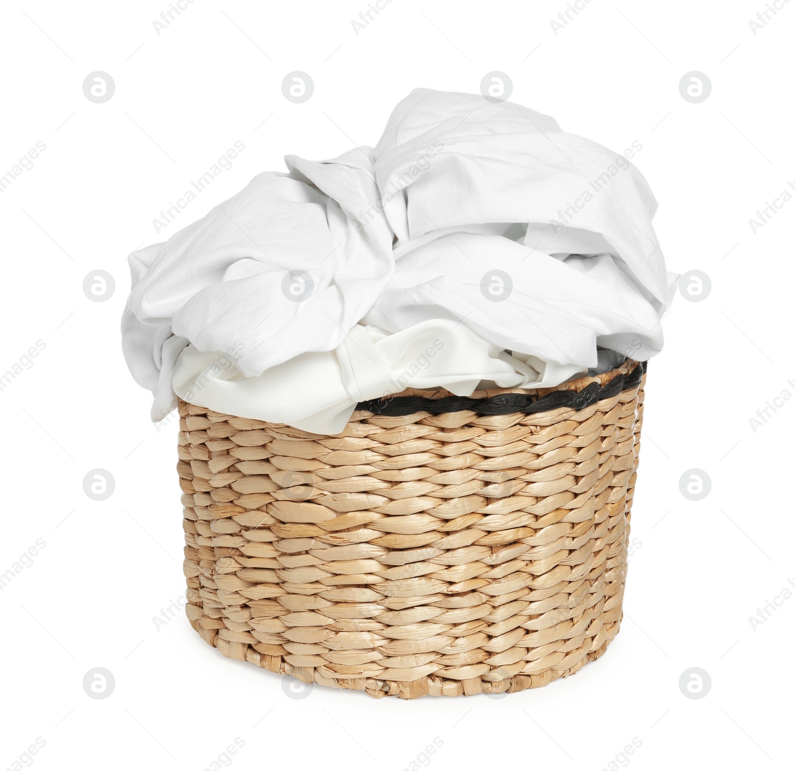 Photo of Wicker laundry basket with clean clothes isolated on white