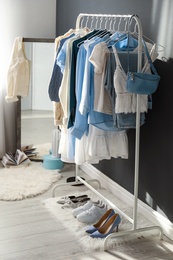 Dressing room interior with clothing rack indoors