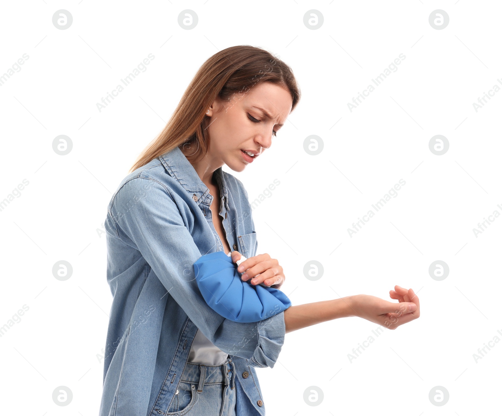 Photo of Woman applying cold compress to relieve arm pain on white background