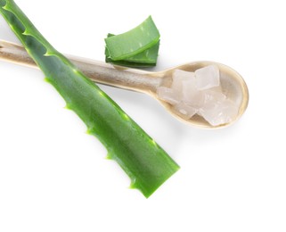 Photo of Spoon with peeled aloe vera and pieces of green plant isolated on white, top view