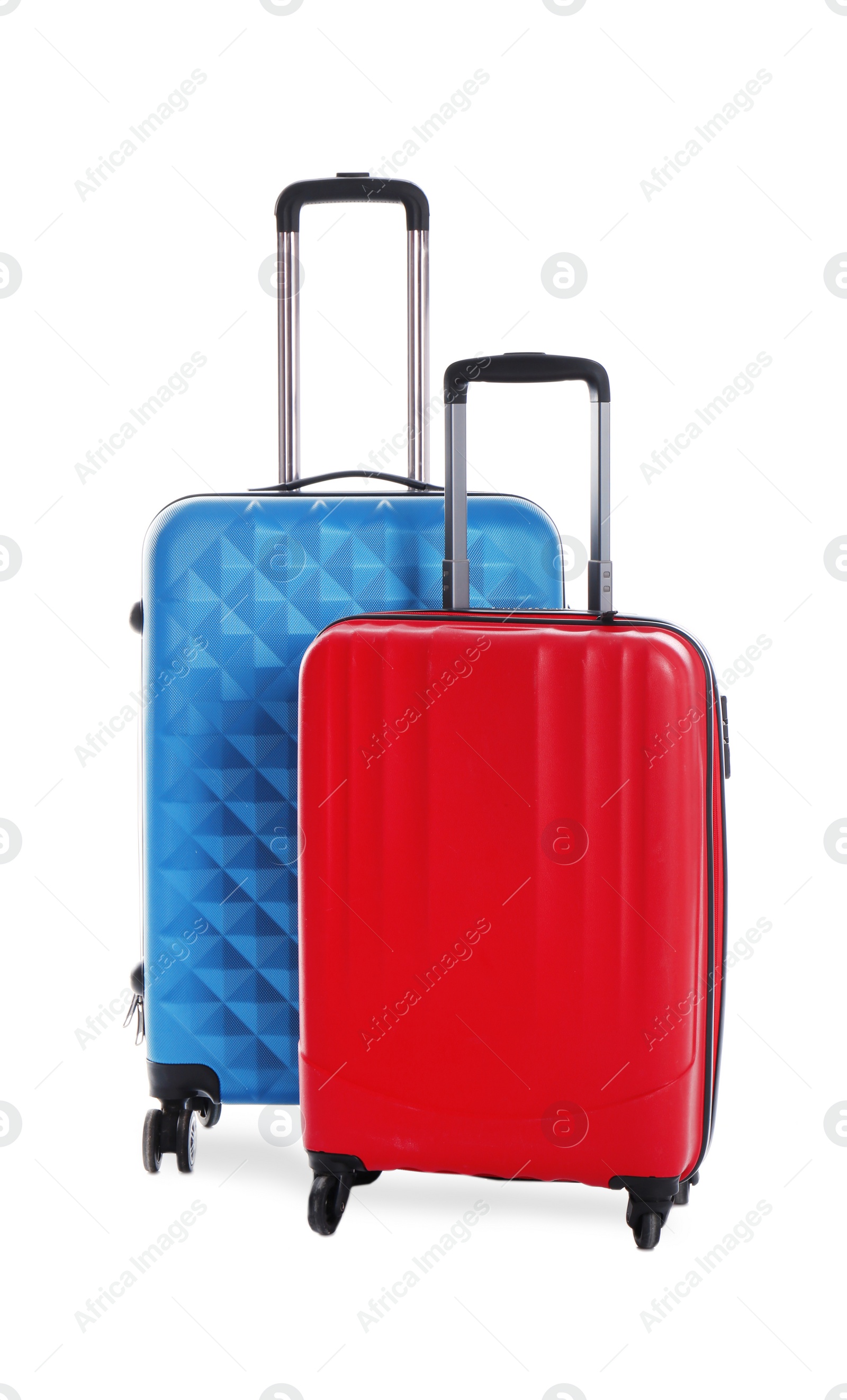 Photo of Modern suitcases for travelling on white background