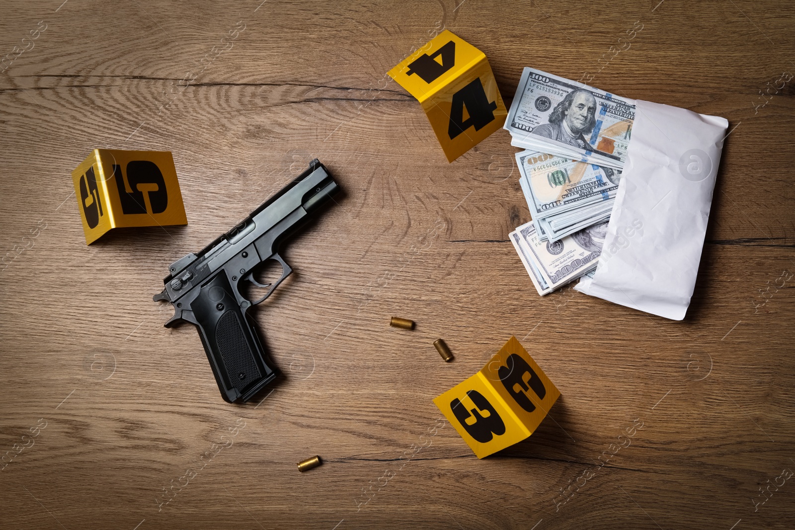 Photo of Flat lay composition with evidences and crime scene markers on wooden background