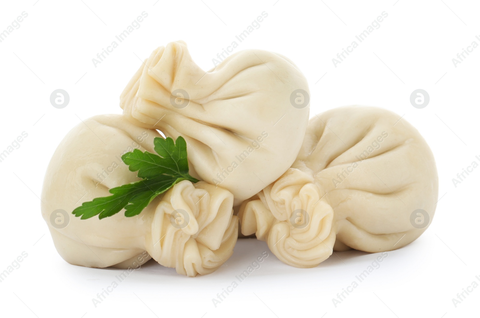 Photo of Boiled dumplings with tasty filling on white background