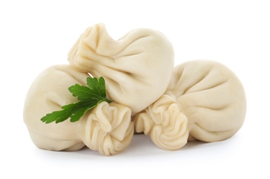 Boiled dumplings with tasty filling on white background