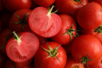 Photo of Fresh ripe red tomatoes as background, closeup