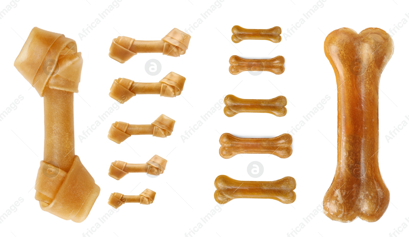 Image of Set with different bone dog treats on white background