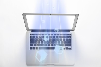 Speed internet. Modern laptop on white background, above view. Motion blur effect symbolizing fast connection