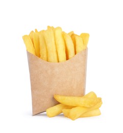 Photo of Paper takeout container with delicious french fries on white background
