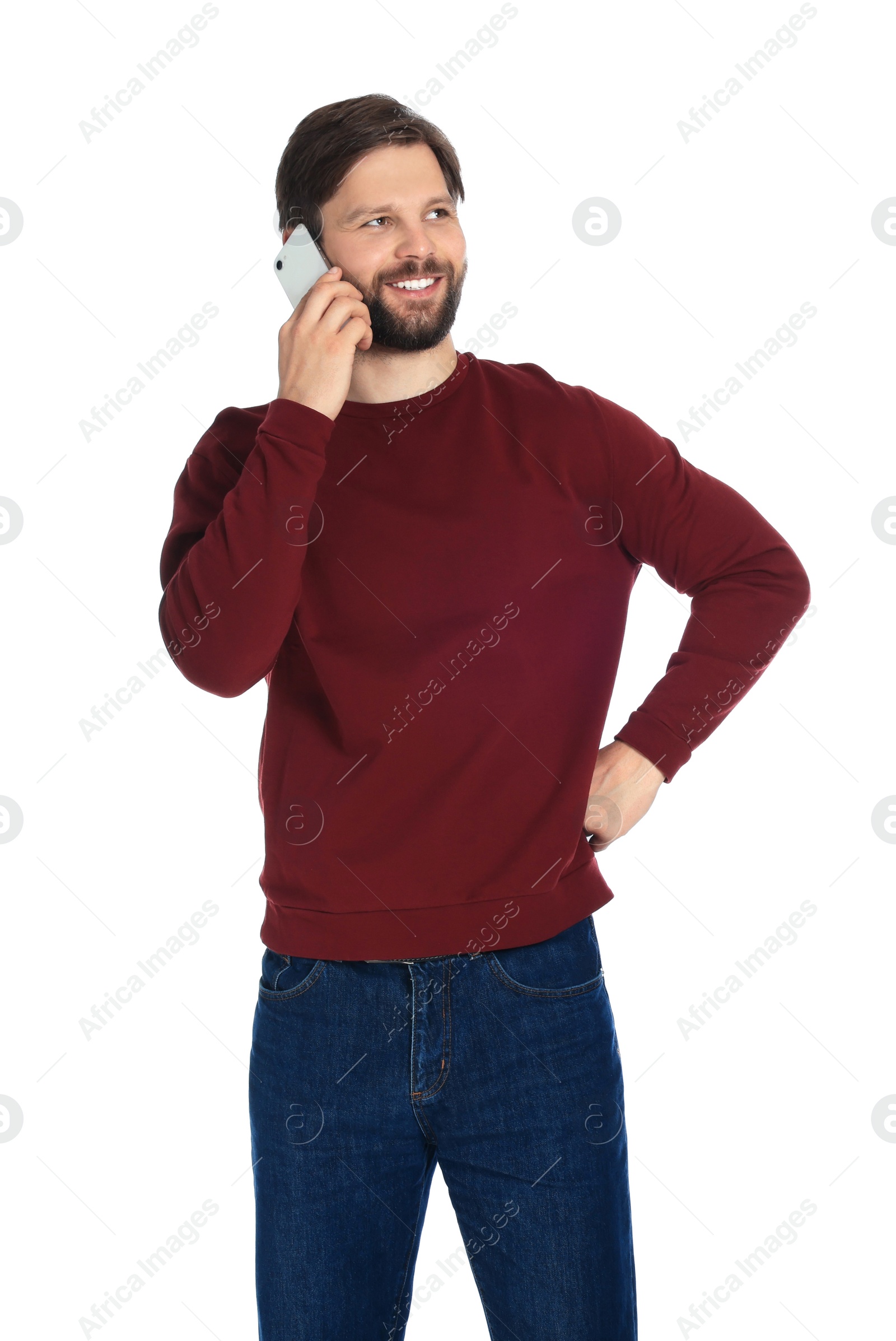 Photo of Man talking on smartphone against white background