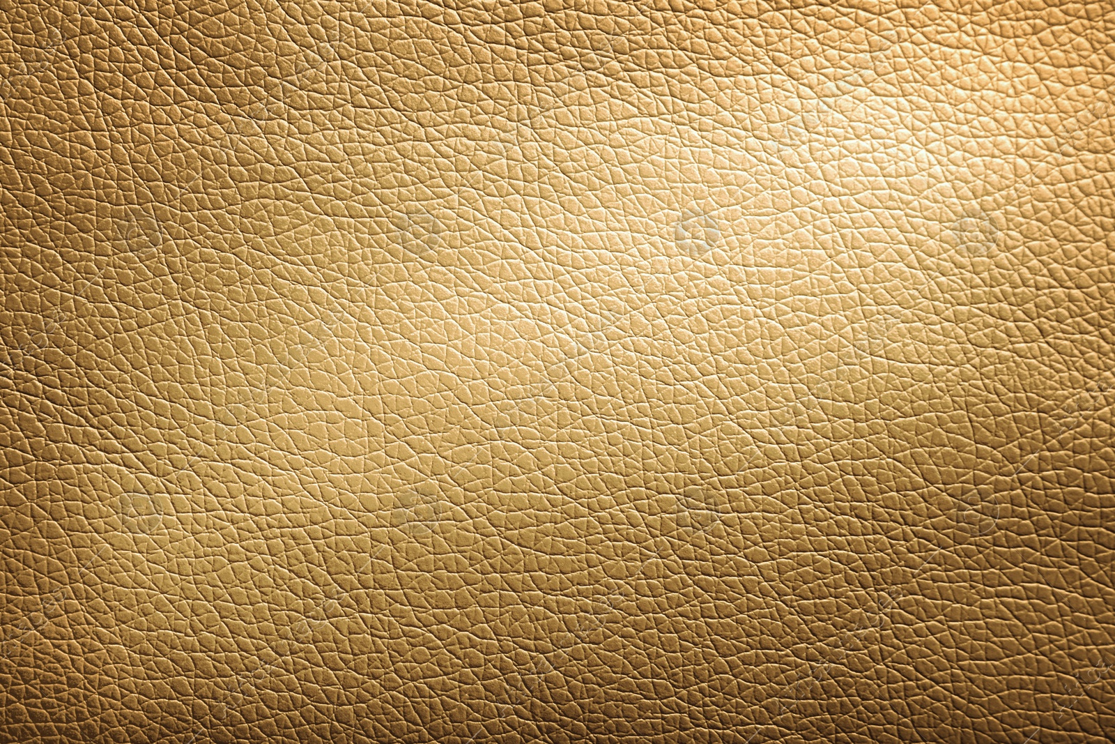 Image of Golden textured surface as background, closeup view