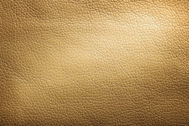 Image of Golden textured surface as background, closeup view